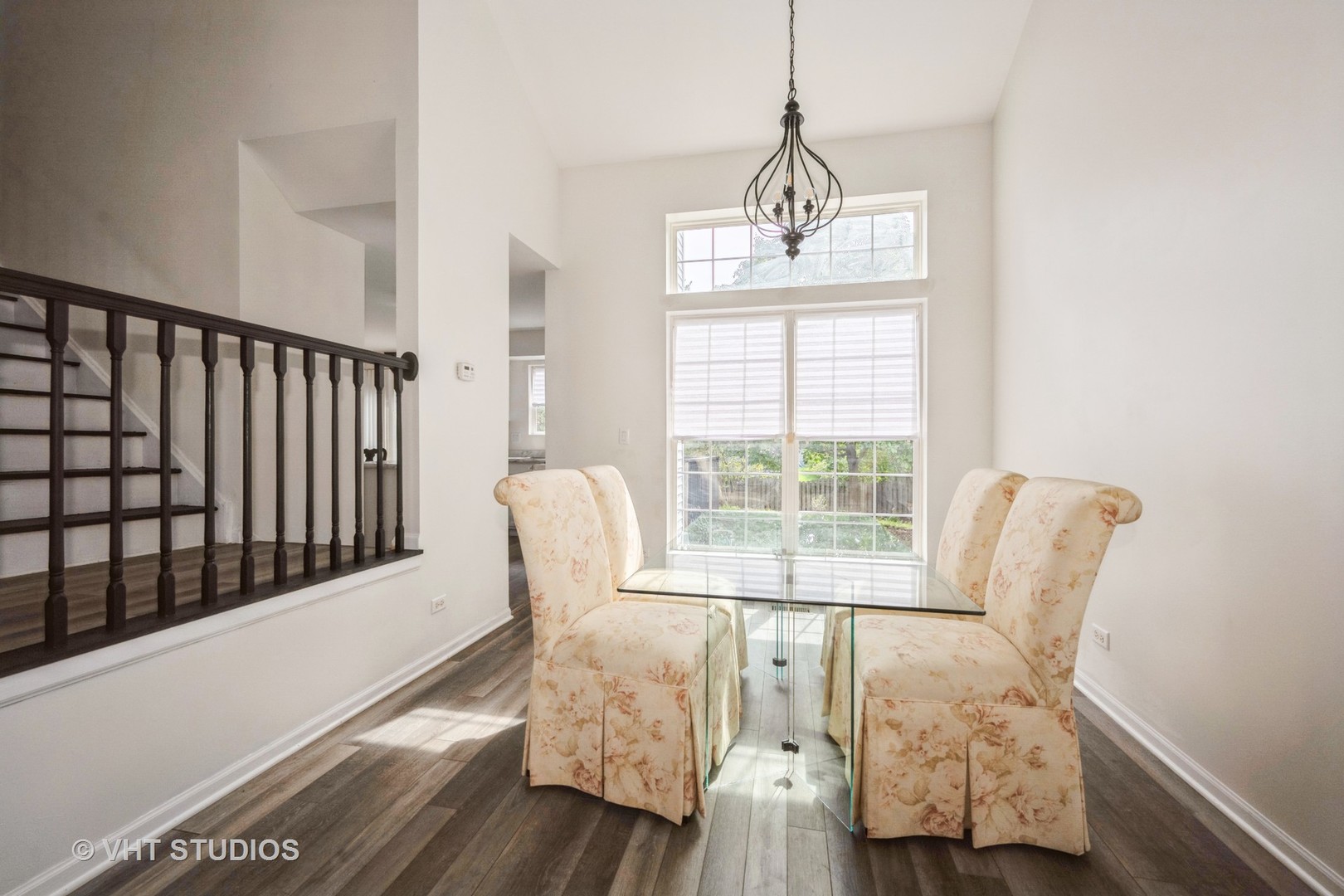 583 Greystone Lane Bolingbrook, IL 60440 - Photo 6 of 28 a view of a room with wooden floor and windows