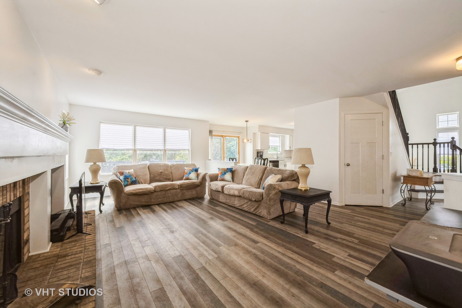 583 Greystone Lane Bolingbrook, IL 60440 - Photo 10 of 28 a living room with furniture and a fireplace