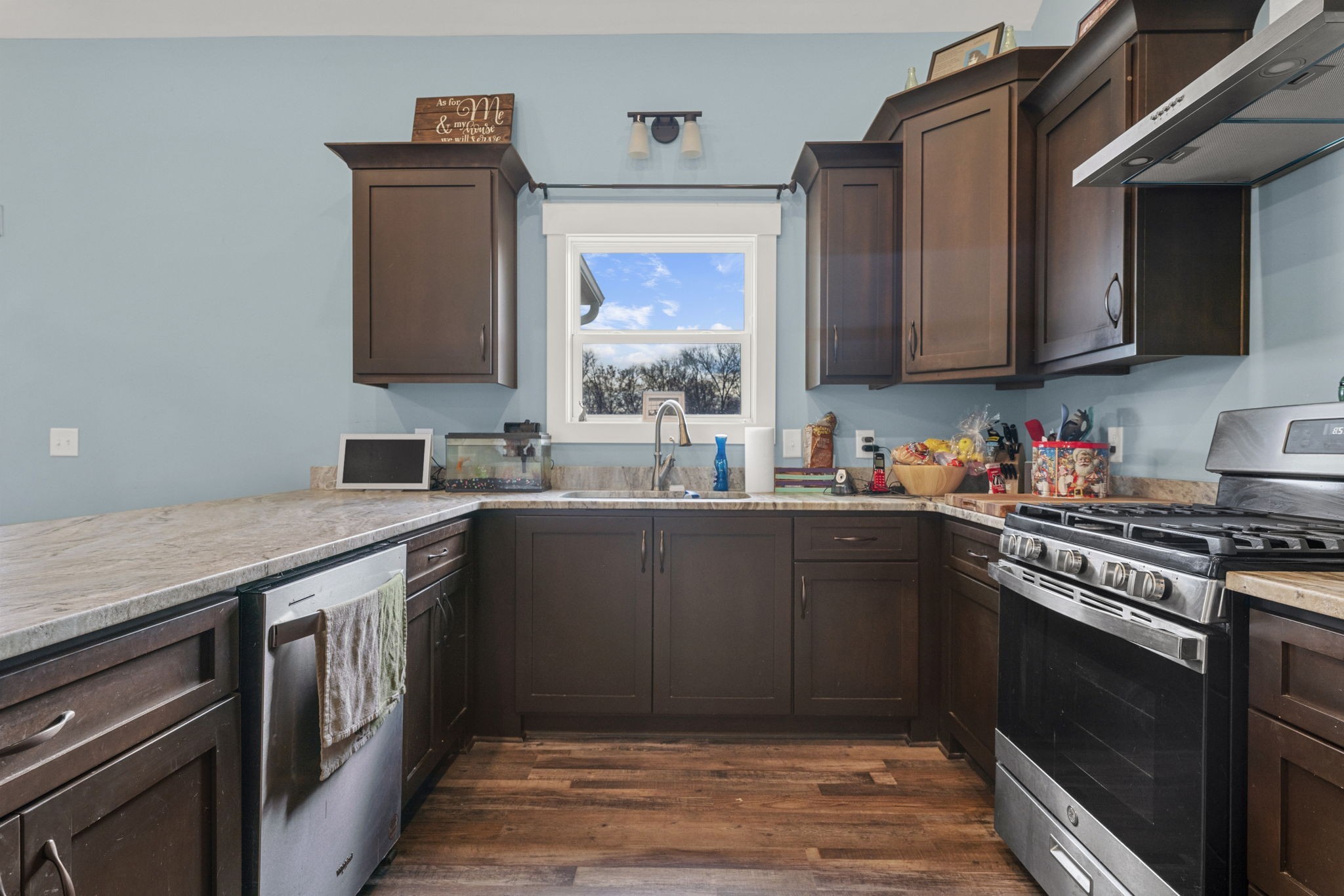 2086 Beverly Court Springfield, TN 37172 - Photo 10 of 39 a kitchen with stainless steel appliances granite countertop a stove a sink and a microwave