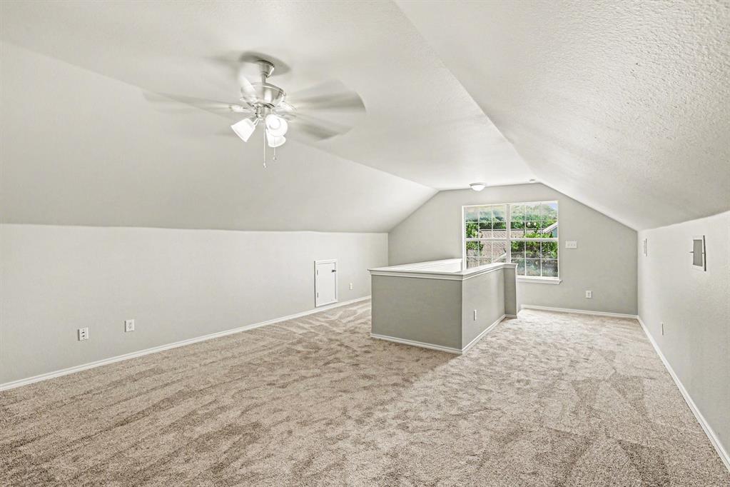 6113 Haley Lane Fort Worth, TX 76132 - Photo 25 of 38 Upstairs large Bonus room. New carpet, new ceiling fan, ensuite bathroom. This room can be a second primary bedroom, game room, guest room office etc..