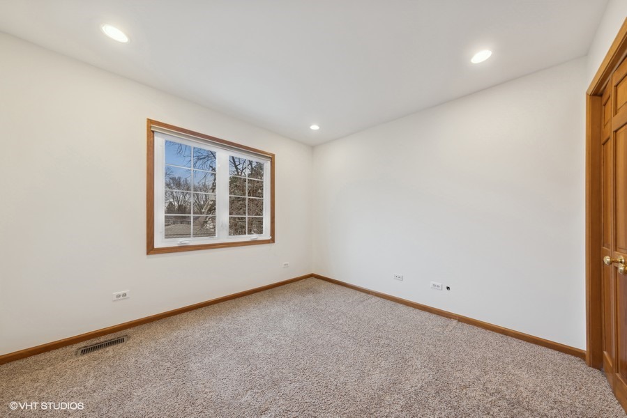 1114 Taft Avenue Wheaton, IL 60189 - Photo 15 of 24 an empty room with a window