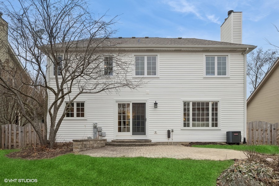 1114 Taft Avenue Wheaton, IL 60189 - Photo 20 of 24 a view of a house with a yard
