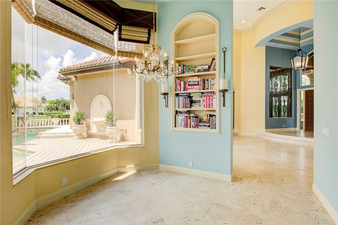 6468 Northwest 31st Way Boca Raton, FL 33496 - Photo 12 of 43 a view of a room that has a lot of stuff and hardwood floor