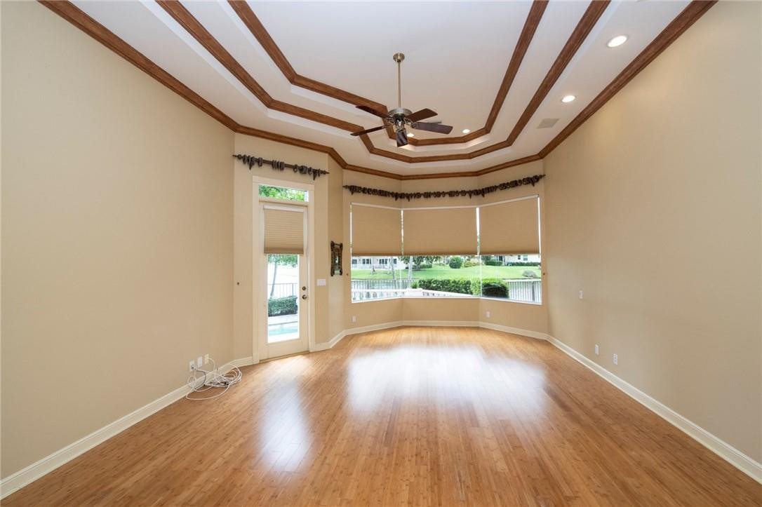 6468 Northwest 31st Way Boca Raton, FL 33496 - Photo 16 of 43 a view of an entryway with wooden floor