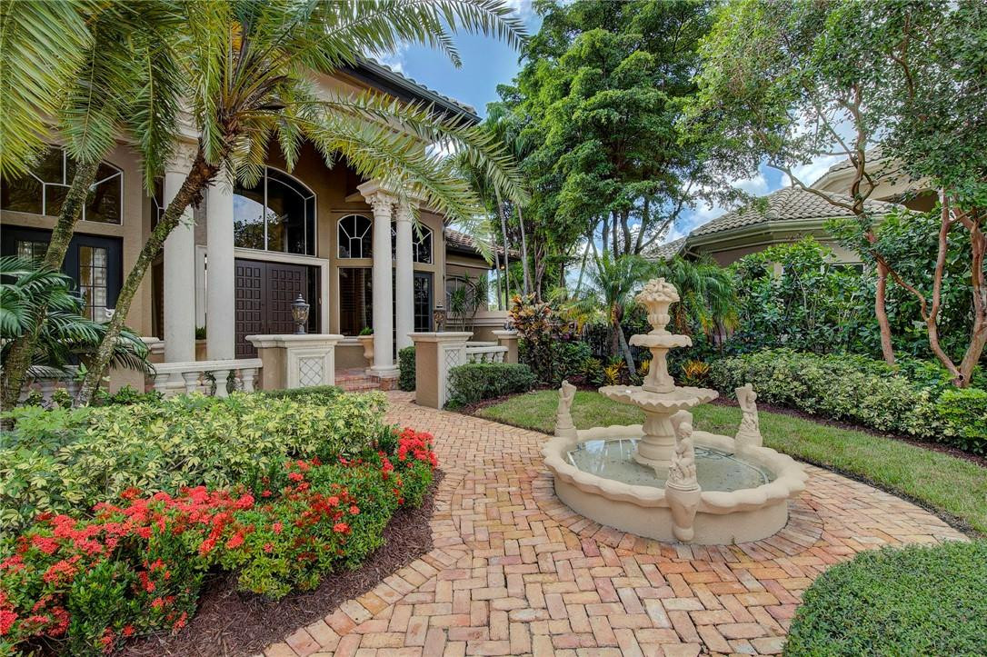 6468 Northwest 31st Way Boca Raton, FL 33496 - Photo 3 of 43 a view of a fountain in front of house