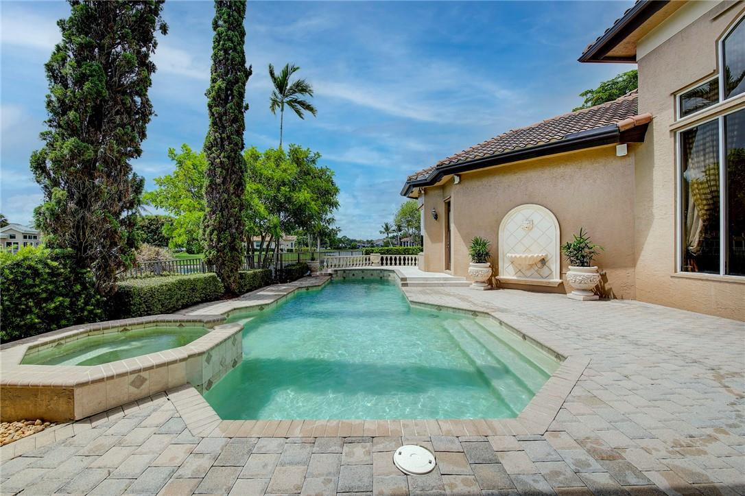 6468 Northwest 31st Way Boca Raton, FL 33496 - Photo 34 of 43 a view of swimming pool with a yard
