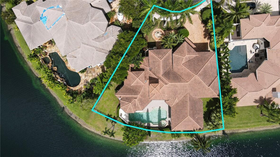 6468 Northwest 31st Way Boca Raton, FL 33496 - Photo 40 of 43 an aerial view of a house