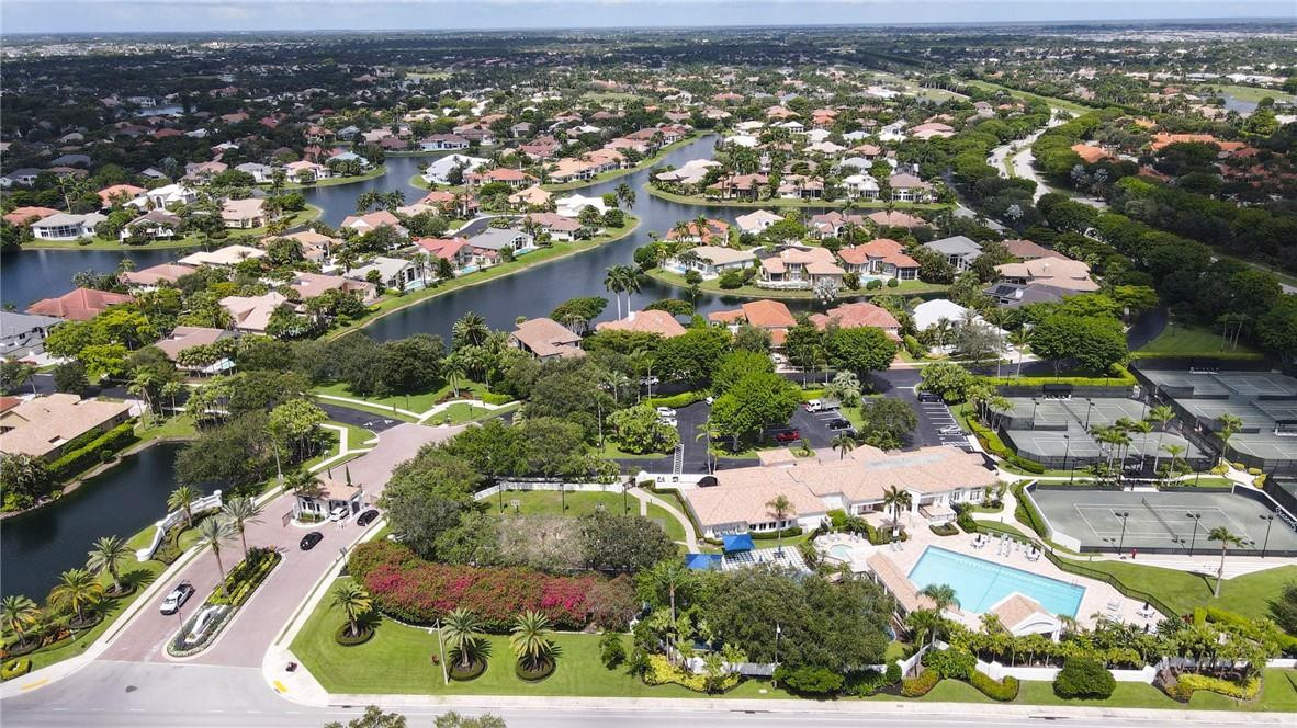 6468 Northwest 31st Way Boca Raton, FL 33496 - Photo 42 of 43 an aerial view of residential houses with outdoor space