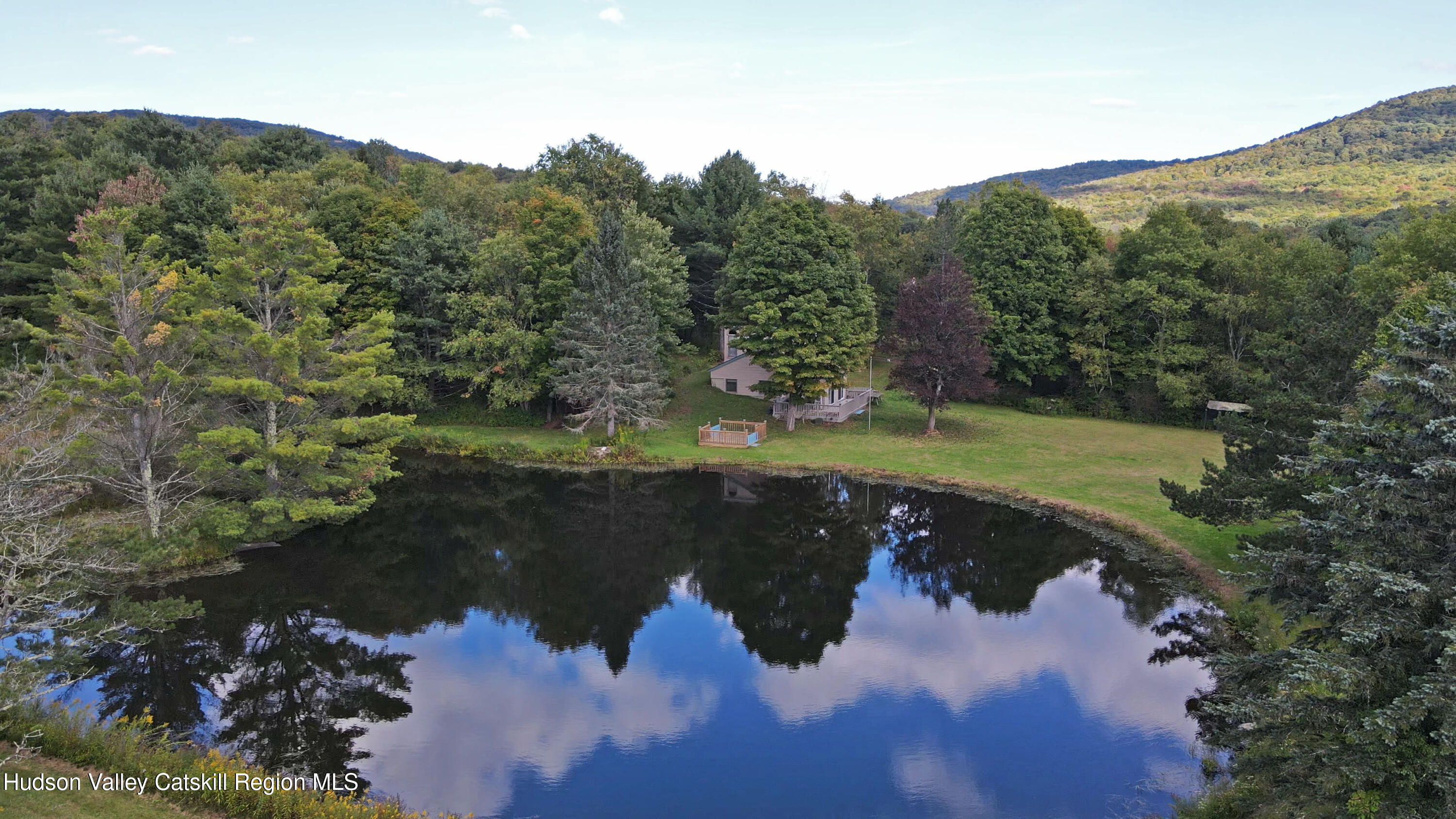 135 Mahogany Ridge Stamford, NY 12167 - Photo 22 of 63 drone-pond-house-mountains