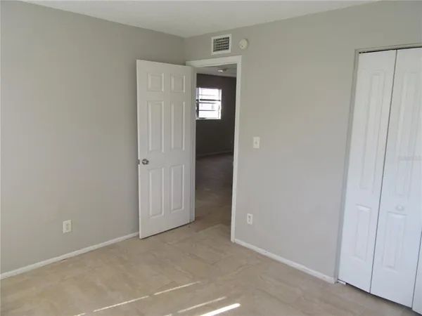 wooden floor and window in a room