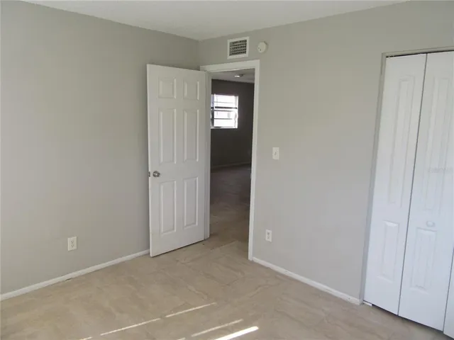 wooden floor and window in a room