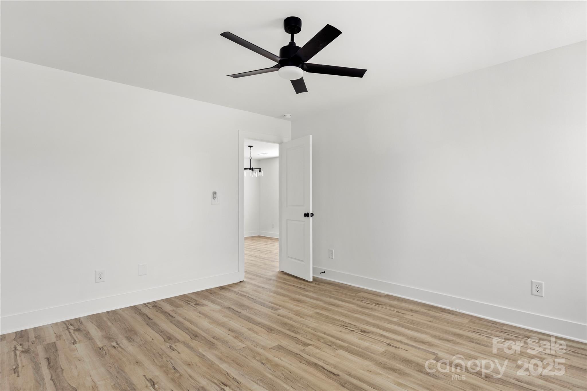 2022 4th Street Southwest Hickory, NC 28602 - Photo 17 of 31 wooden floor in an empty room
