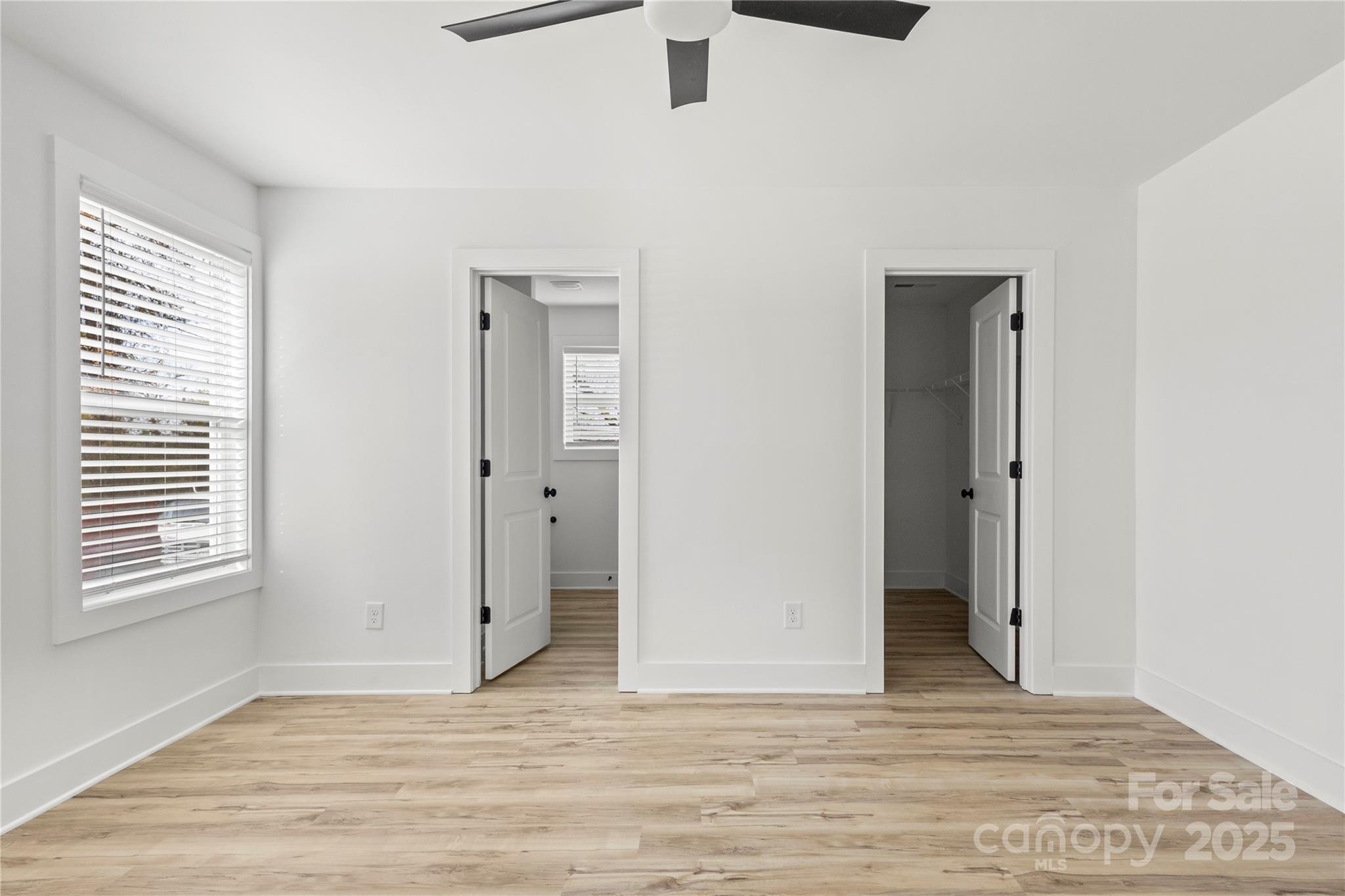 2022 4th Street Southwest Hickory, NC 28602 - Photo 18 of 31 an empty room with windows and closet