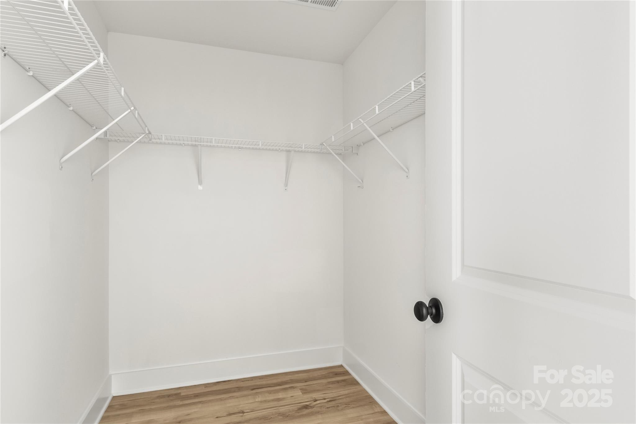 2022 4th Street Southwest Hickory, NC 28602 - Photo 23 of 31 a view of a room with wooden floor