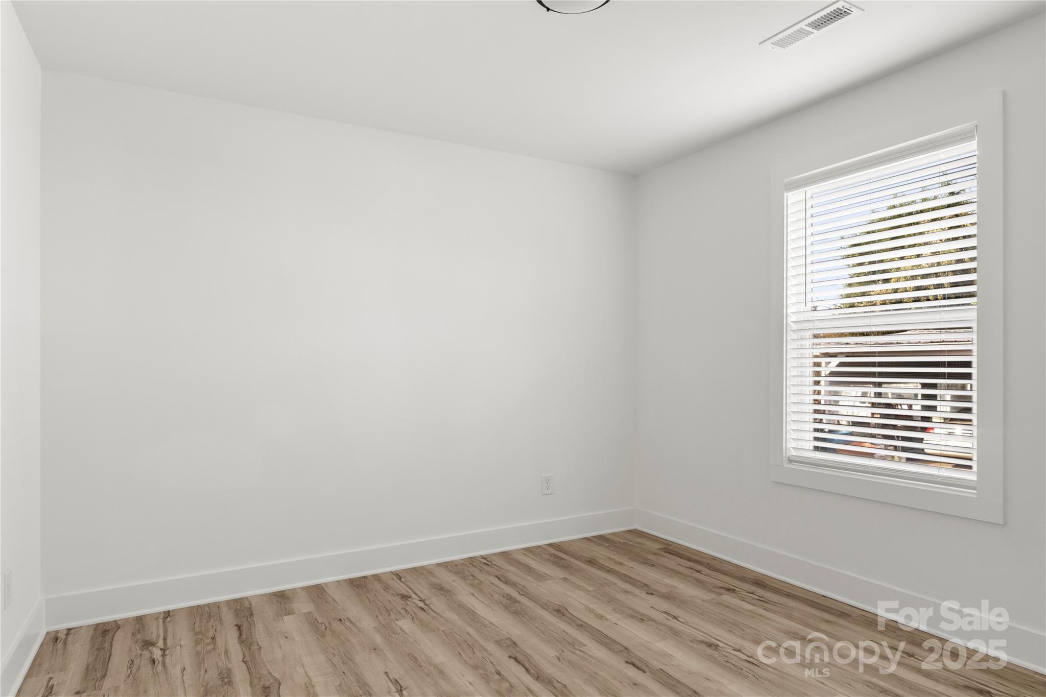 2022 4th Street Southwest Hickory, NC 28602 - Photo 25 of 31 an empty room with a window