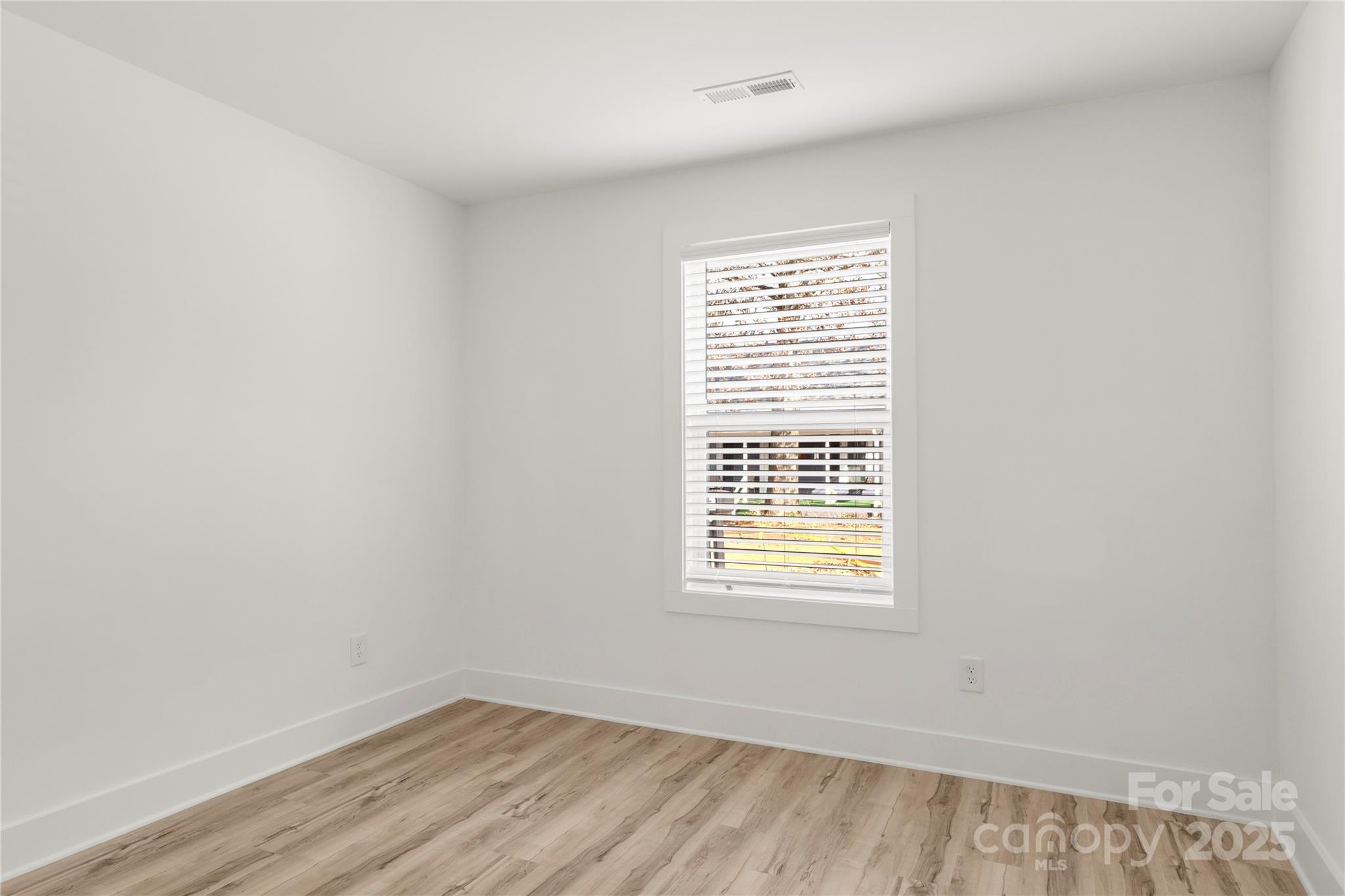 2022 4th Street Southwest Hickory, NC 28602 - Photo 27 of 31 an empty room with a window