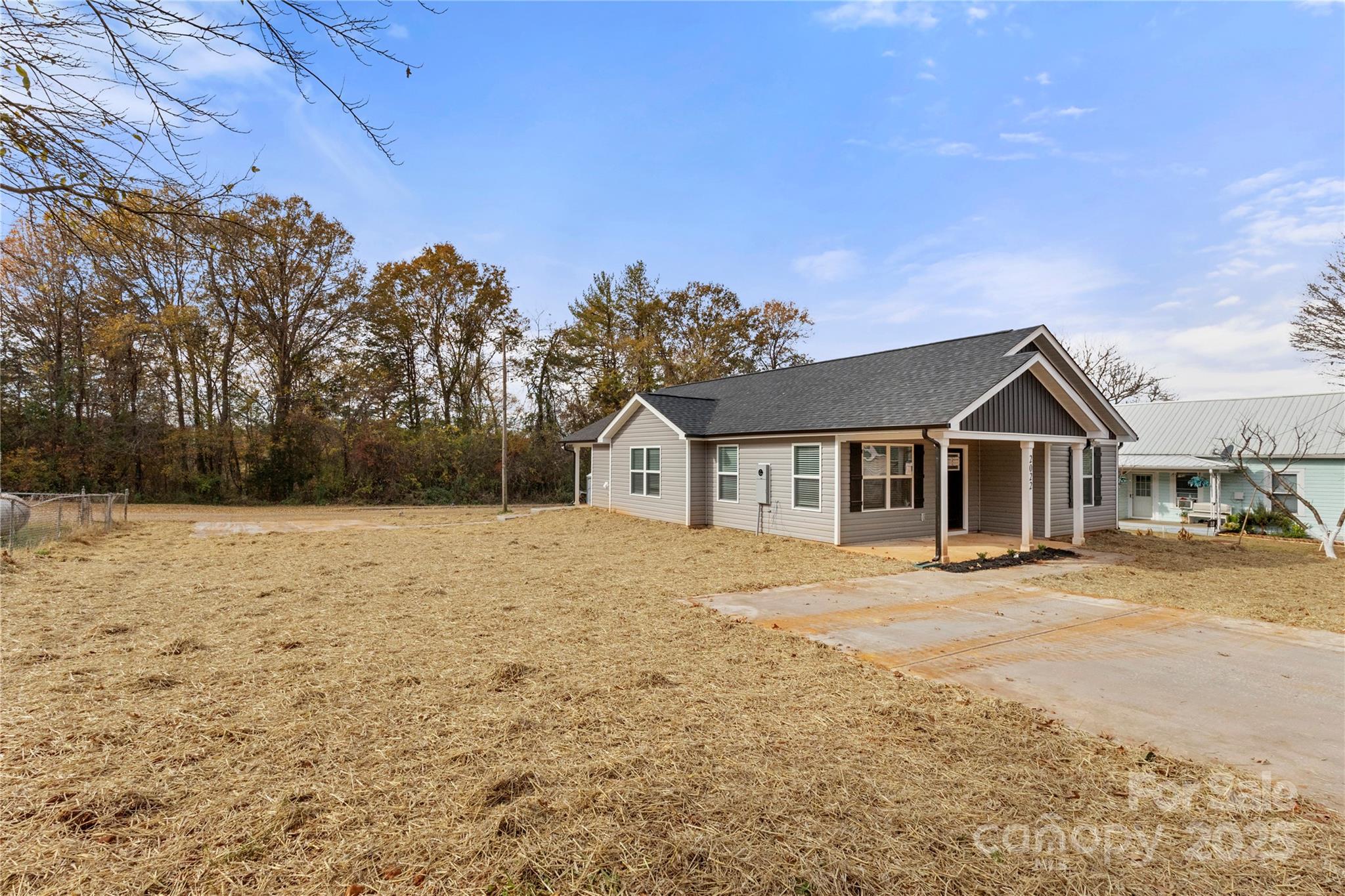 2022 4th Street Southwest Hickory, NC 28602 - Photo 30 of 31 a house with trees in the background