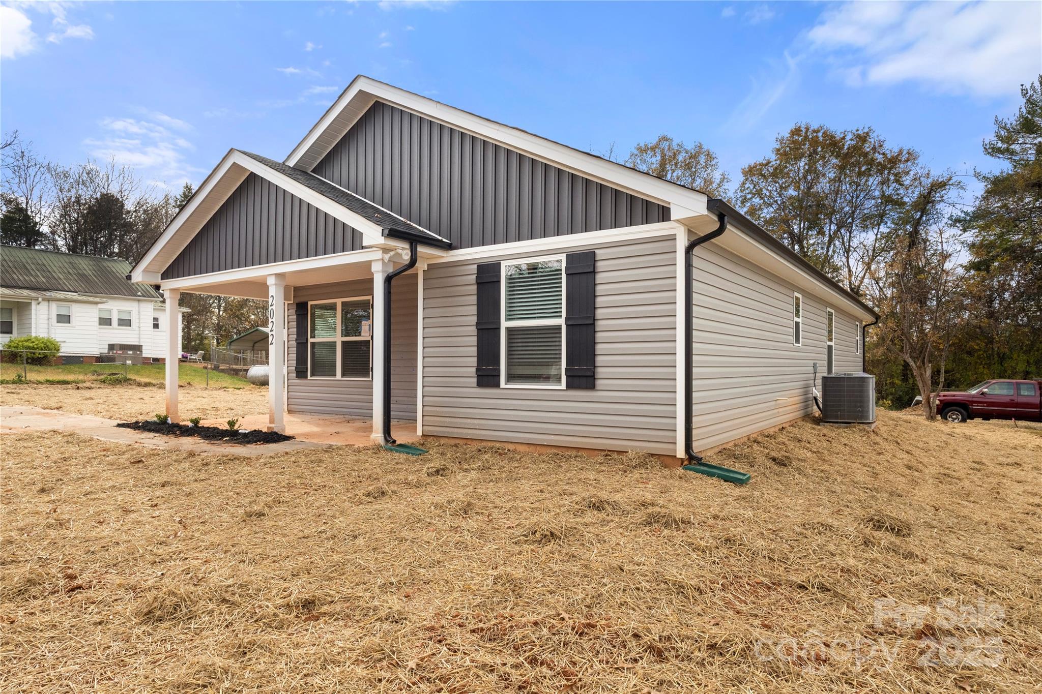 2022 4th Street Southwest Hickory, NC 28602 - Photo 31 of 31 a view of a house with backyard and sitting area
