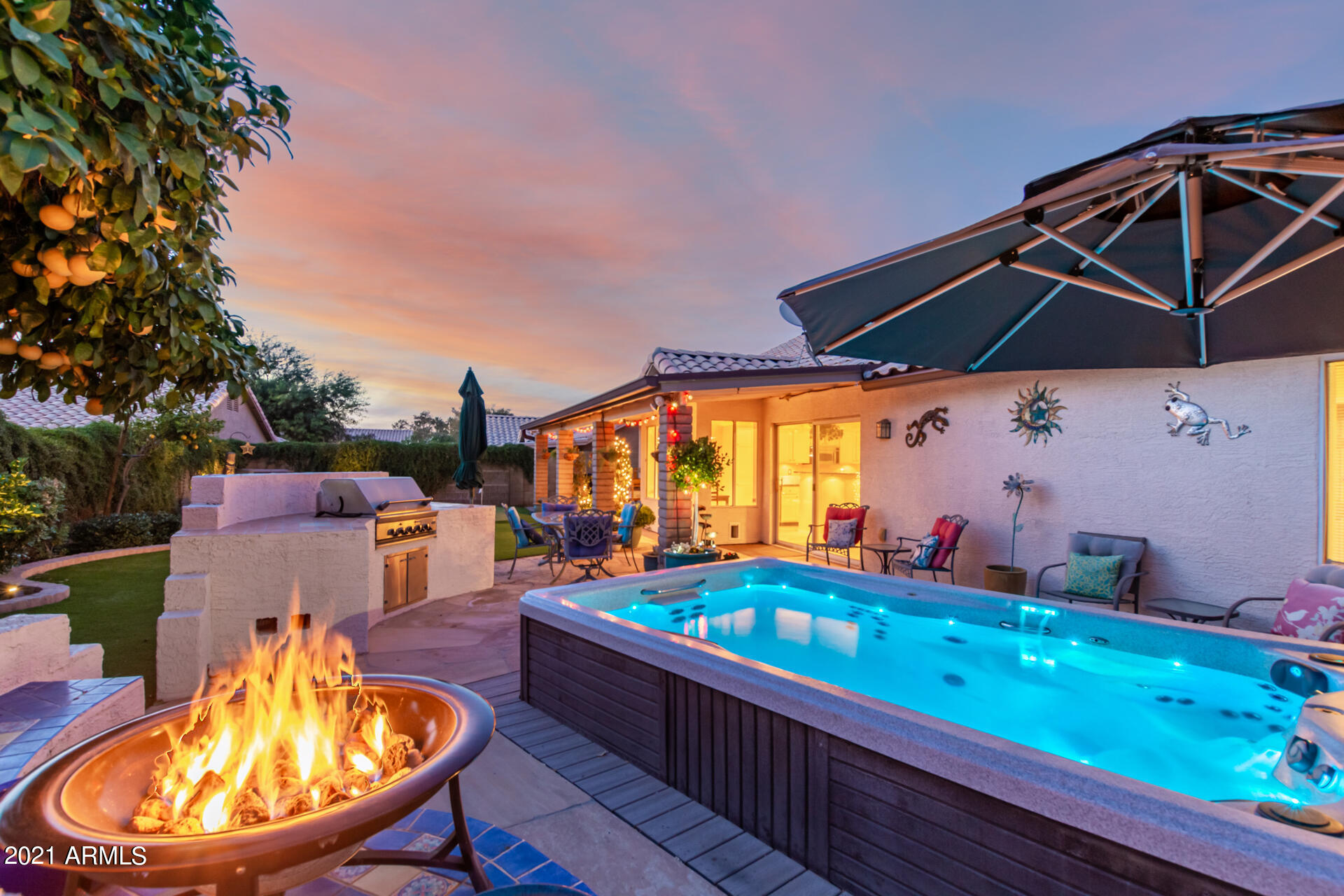 359 West Brisa Drive Gilbert, AZ 85233 - Photo 26 of 40 Fire pit to house