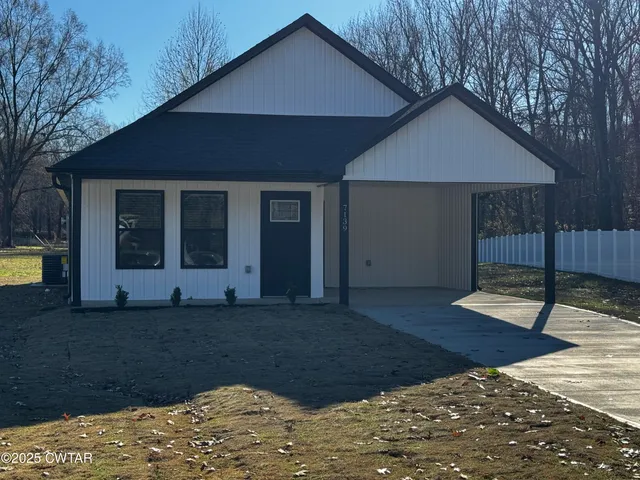 a house view with a garden space