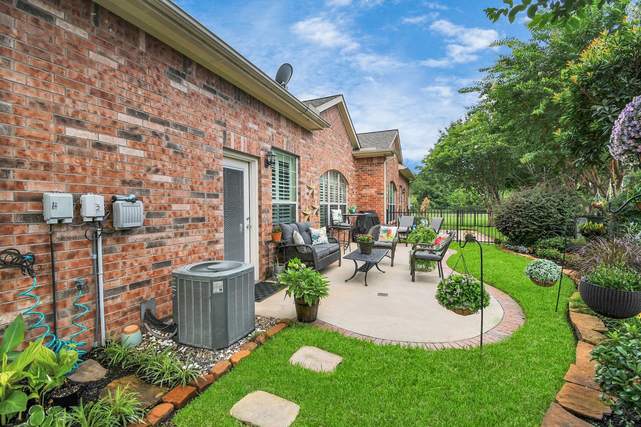 8624 Sunset Loch Drive Spring, TX 77379 - Photo 34 of 44 a view of backyard with seating space and trees
