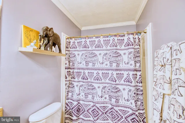 a painting on a wall next to a window