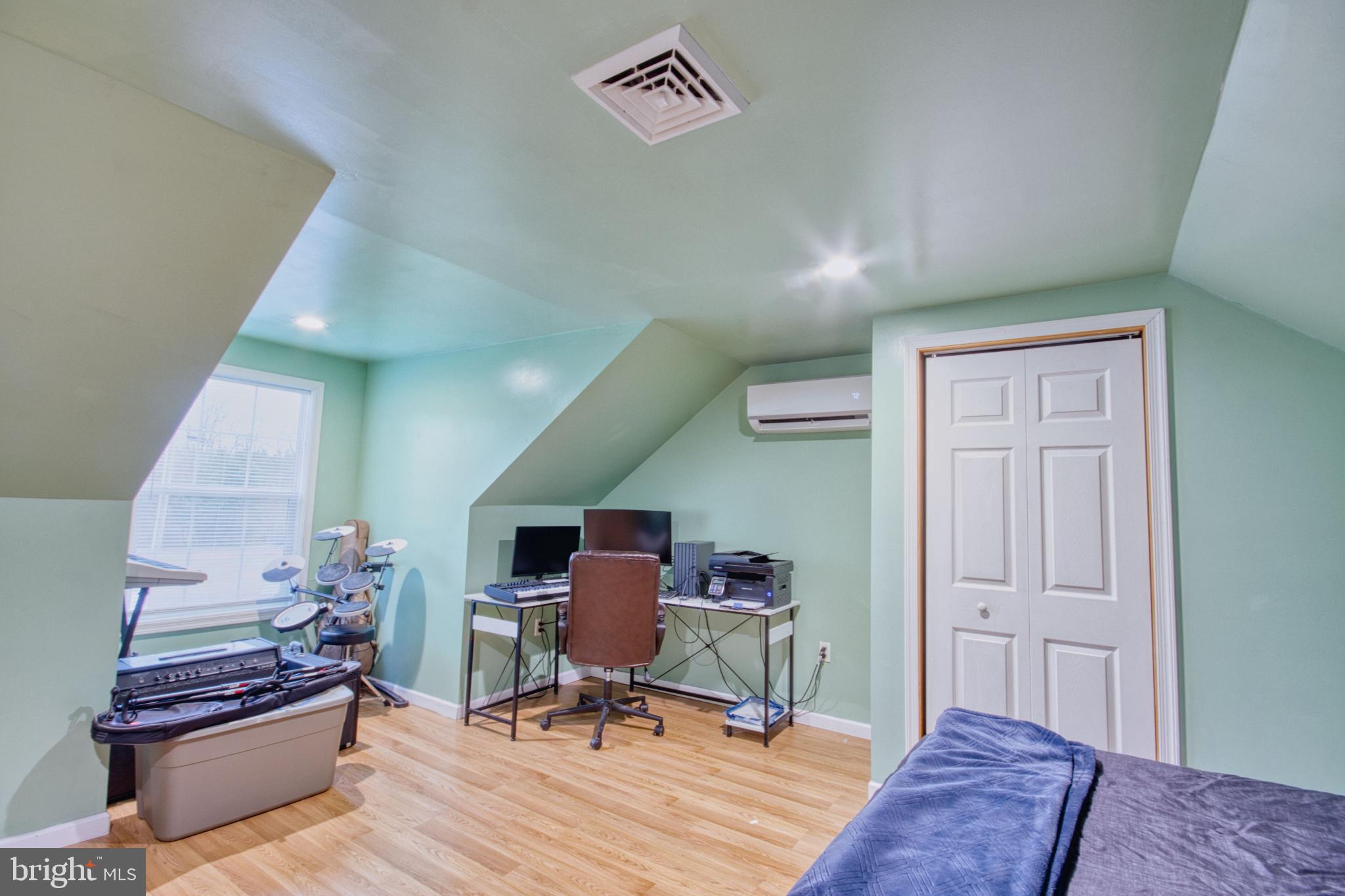 343 Dark Hollow Road Shermans Dale, PA 17090 - Photo 27 of 45 a view of a workspace with furniture and wooden floor