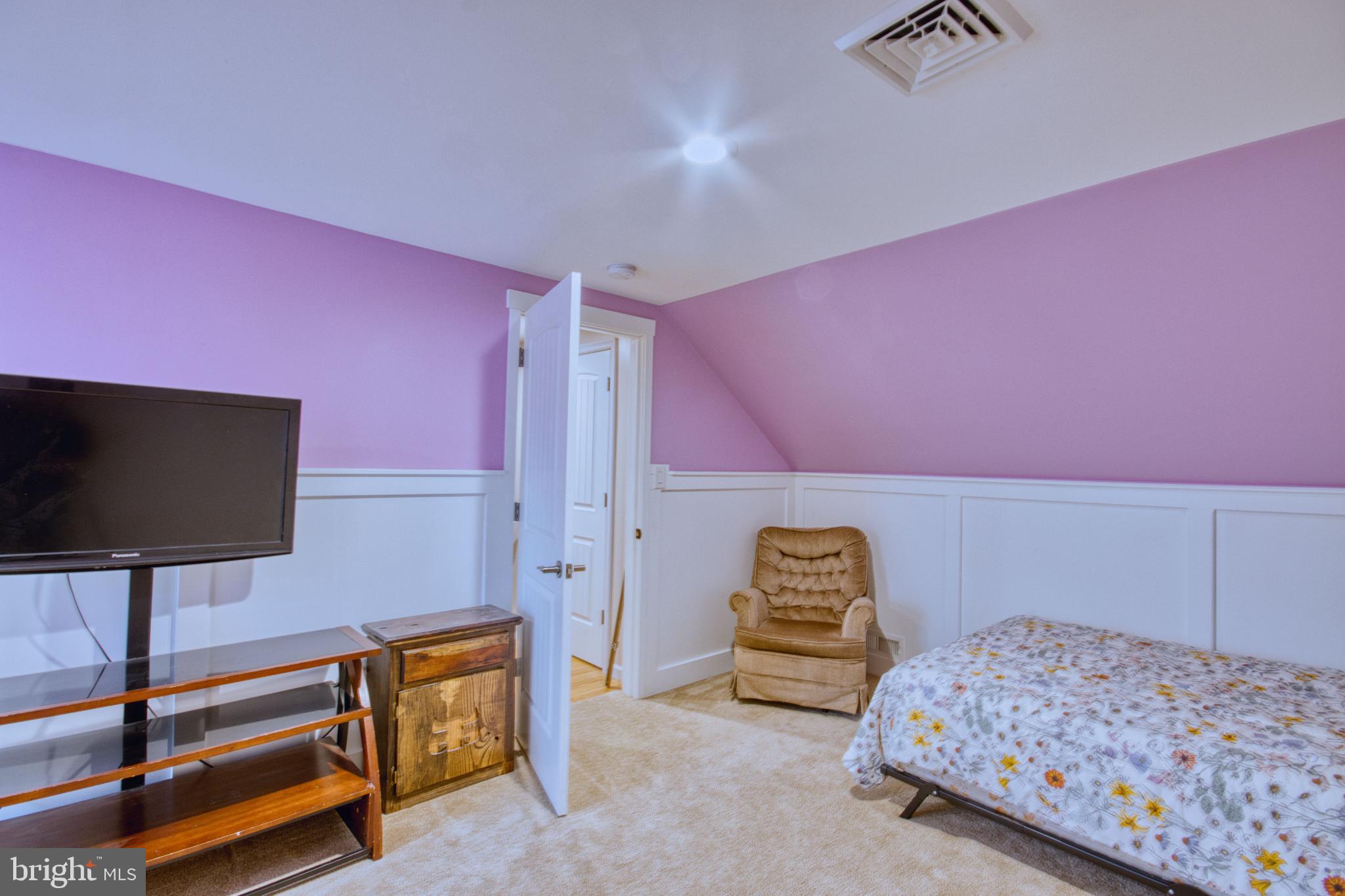 343 Dark Hollow Road Shermans Dale, PA 17090 - Photo 31 of 45 a bedroom with a bed and a flat screen tv