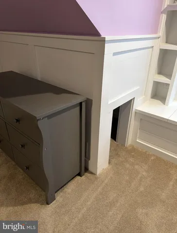 a utility room with washing machine