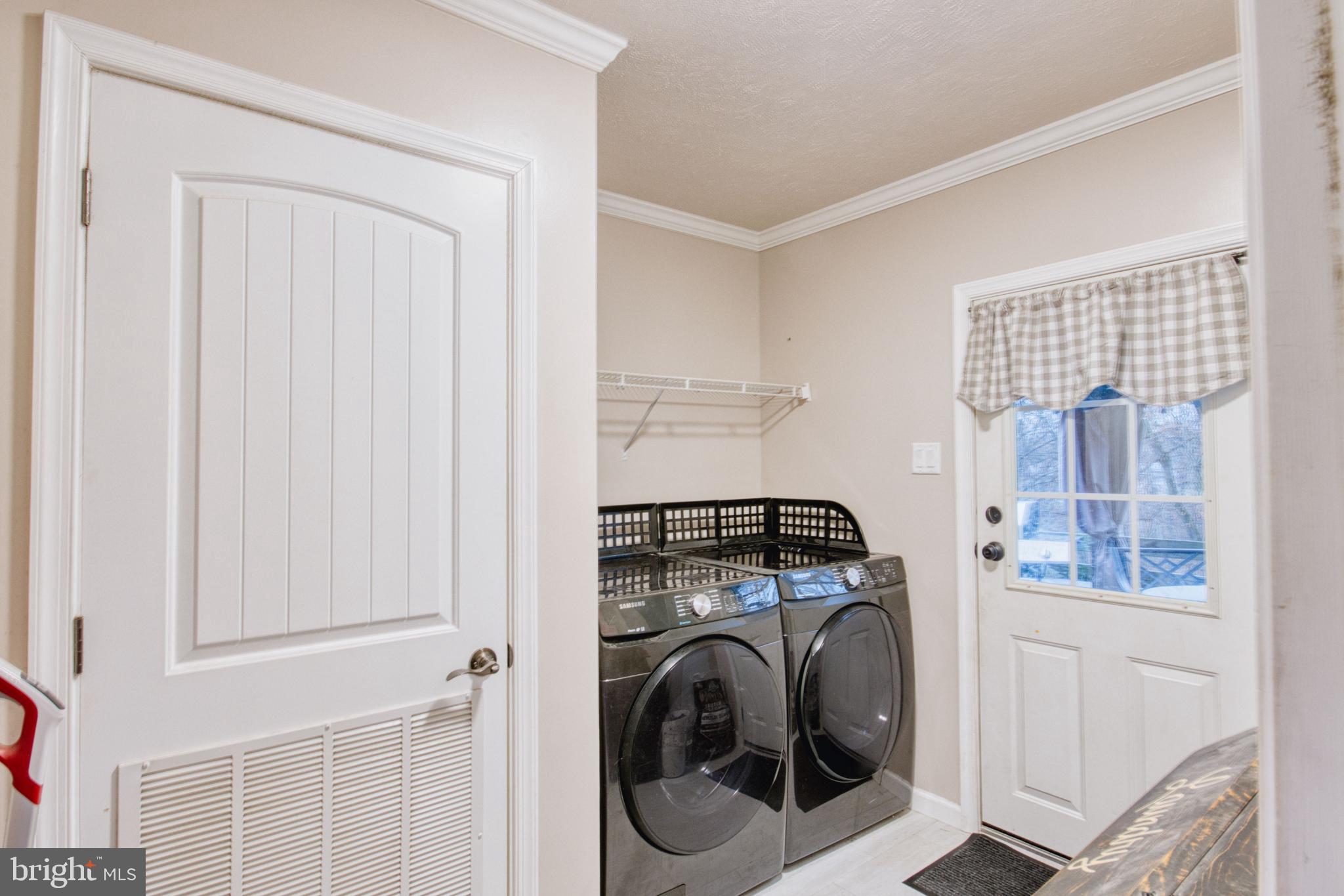 343 Dark Hollow Road Shermans Dale, PA 17090 - Photo 39 of 45 a utility room with dryer and washer