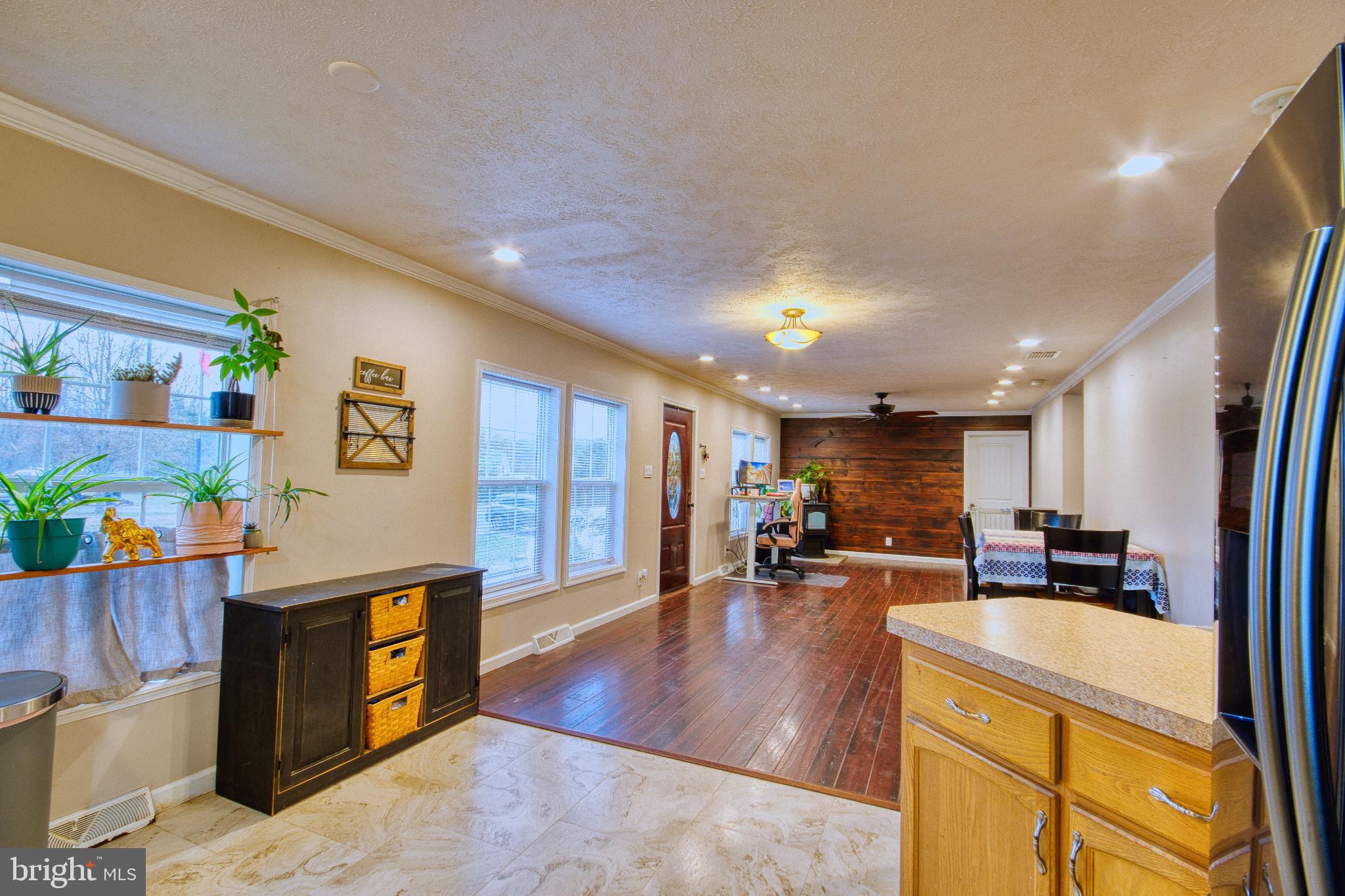 343 Dark Hollow Road Shermans Dale, PA 17090 - Photo 4 of 45 a living room with stainless steel appliances granite countertop furniture wooden floor and a window