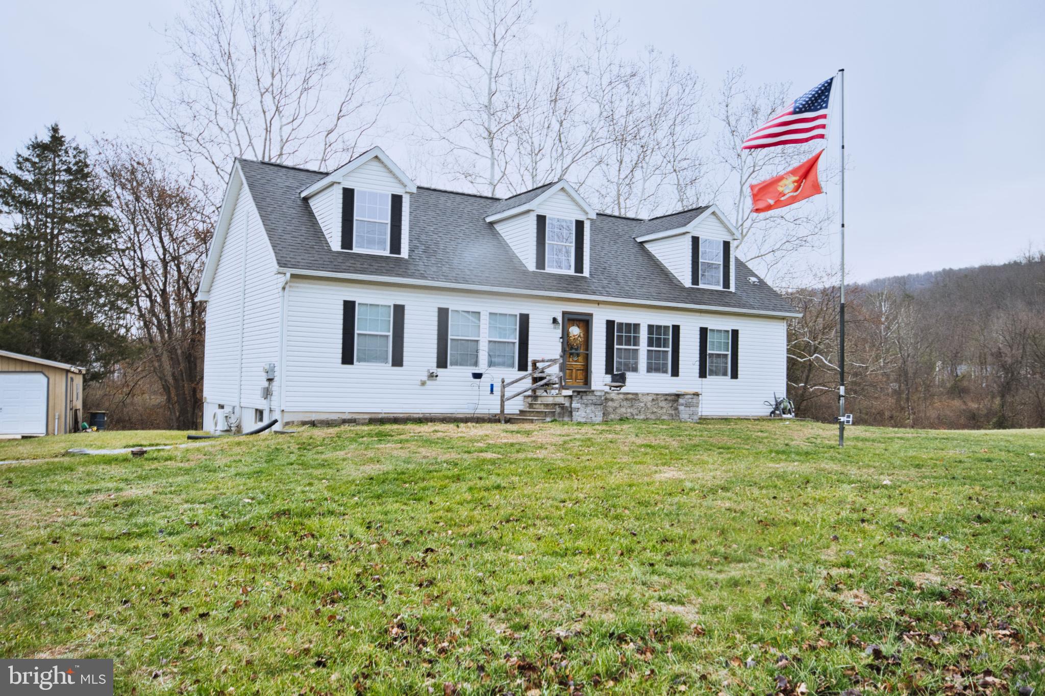 343 Dark Hollow Road Shermans Dale, PA 17090 - Photo 45 of 45 a front view of a house with a garden