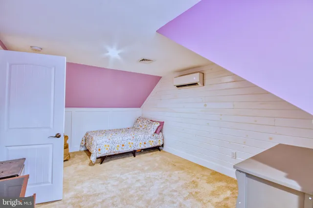 a room with a desk and chair