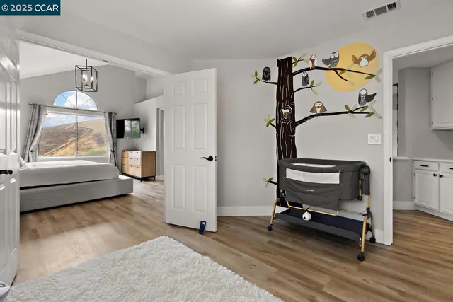 a bathroom with double vanity sink and mirror