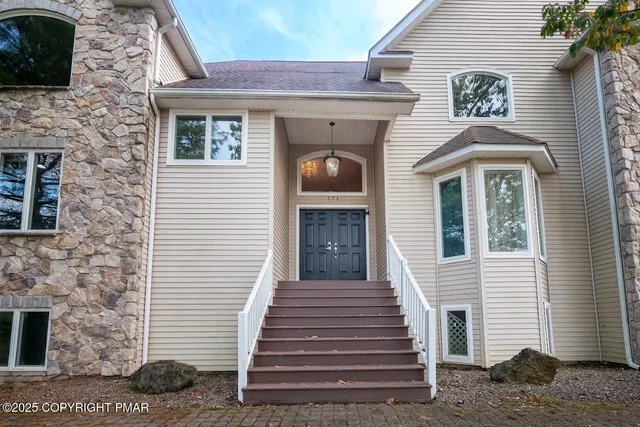 a bathroom with a potted plant and a sink