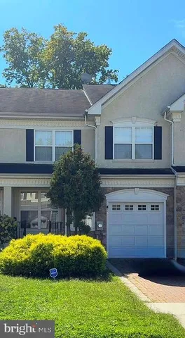 a view of a house with a swimming pool