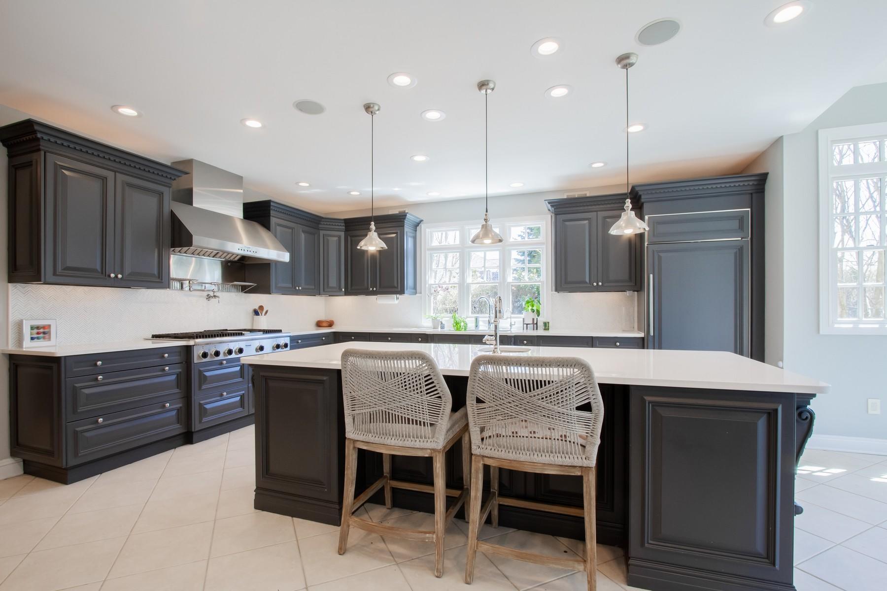 20 Oakes Road Little Silver, NJ 07739 - Photo 8 of 46 a kitchen with a table chairs sink and cabinets