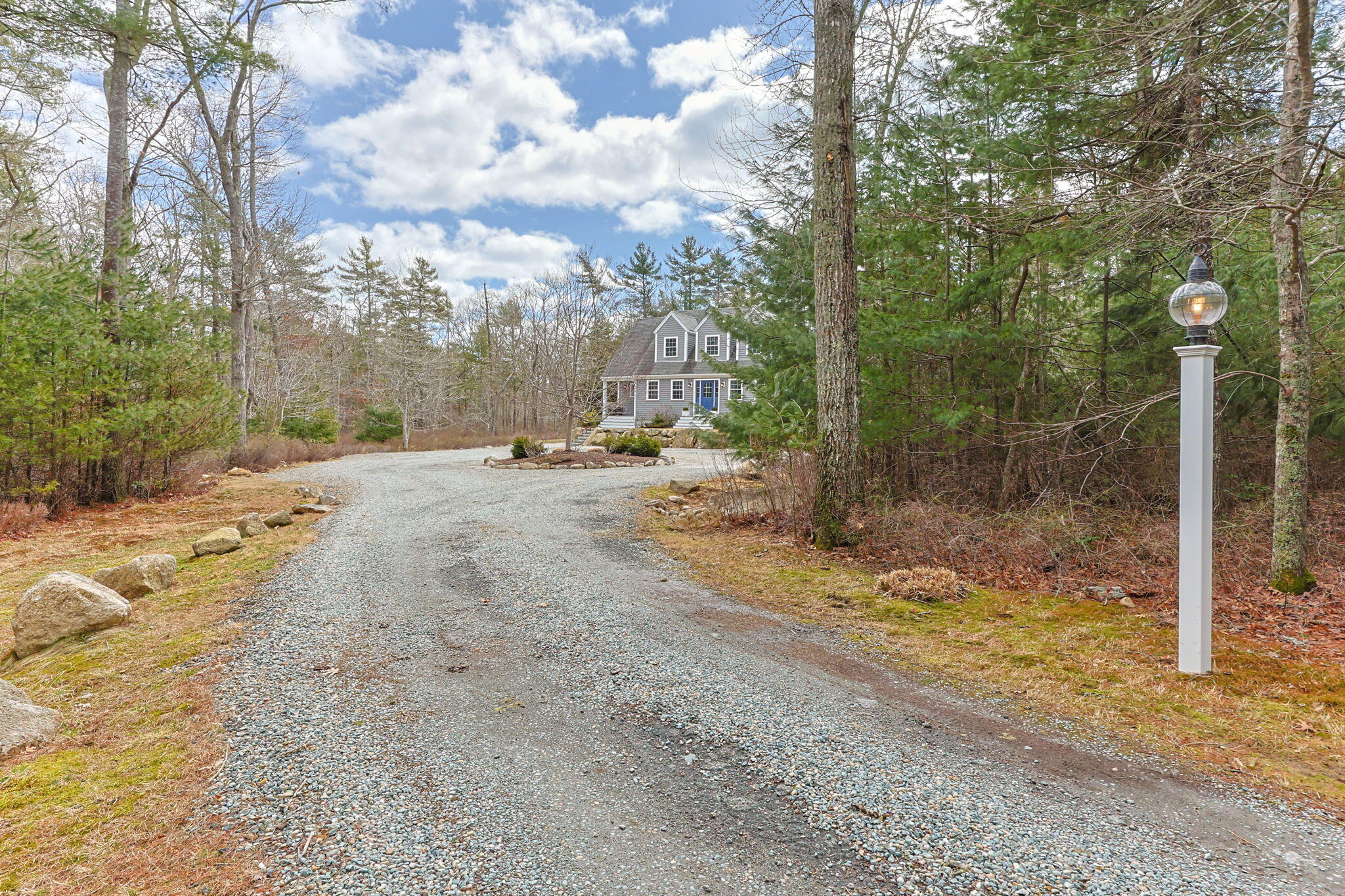 174 Cross Neck Road Marion, MA 02738 - Photo 2 of 41 a view of a yard with wooden fence