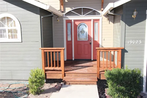 a front view of a house with a porch