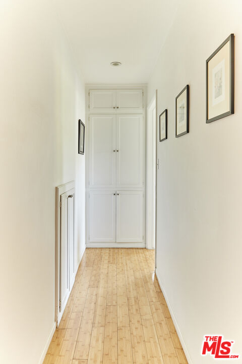 3708 Roderick Road Los Angeles, CA 90065 - Photo 20 of 38 a view of a hallway with wooden floor
