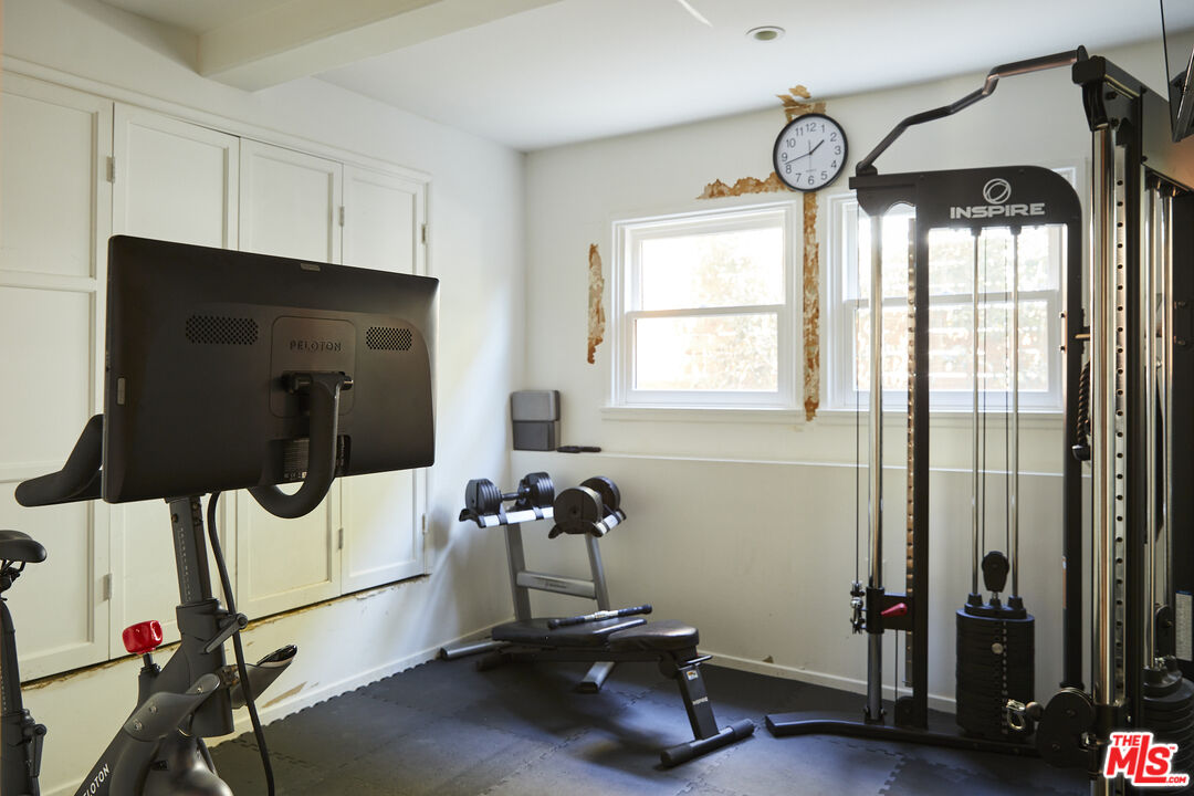 3708 Roderick Road Los Angeles, CA 90065 - Photo 27 of 38 a view of room with wooden floor and windows