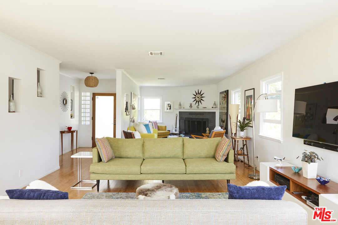 3708 Roderick Road Los Angeles, CA 90065 - Photo 9 of 38 a living room with furniture and a flat screen tv