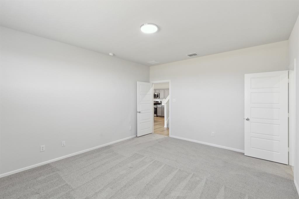 15028 Santoscoy Street Haslet, TX 76052 - Photo 19 of 38 a view of an empty room