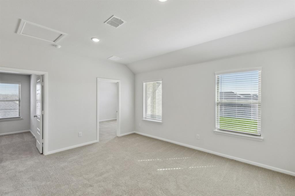 15028 Santoscoy Street Haslet, TX 76052 - Photo 27 of 38 a view of an empty room with a window