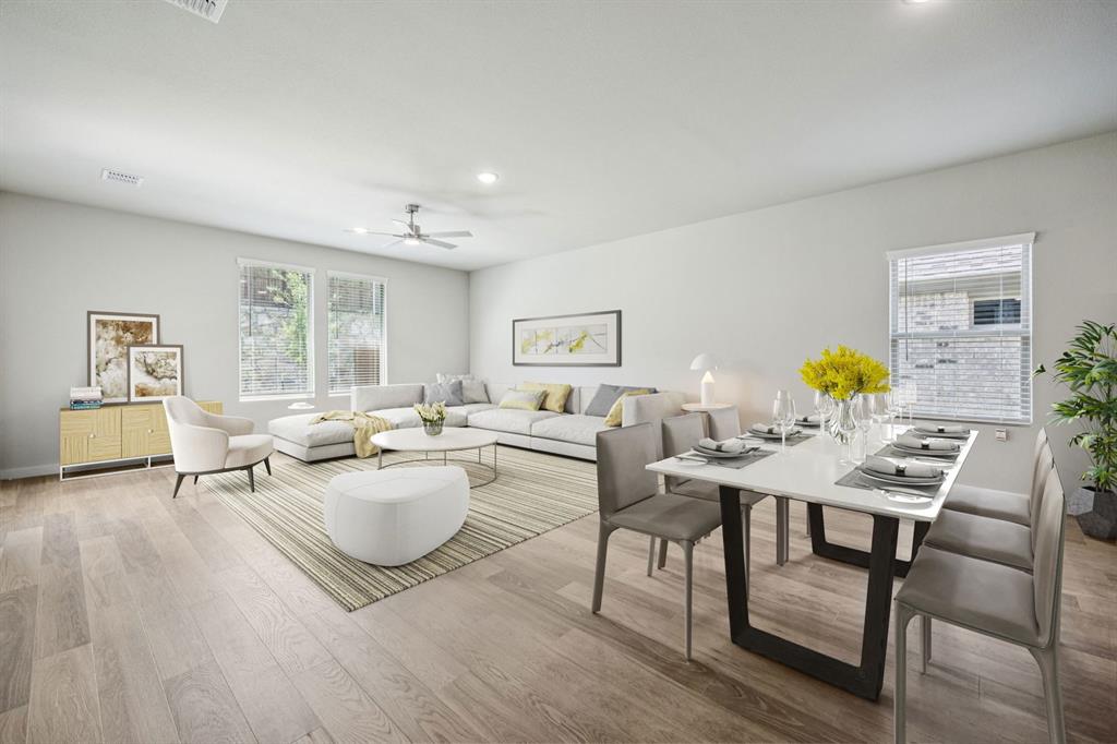15028 Santoscoy Street Haslet, TX 76052 - Photo 10 of 38 a living room with furniture and flowers