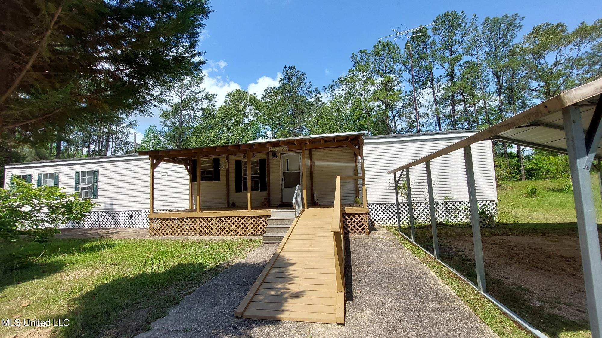 227 Go Go Road Poplarville, MS 39470 - Photo 1 of 23 Front