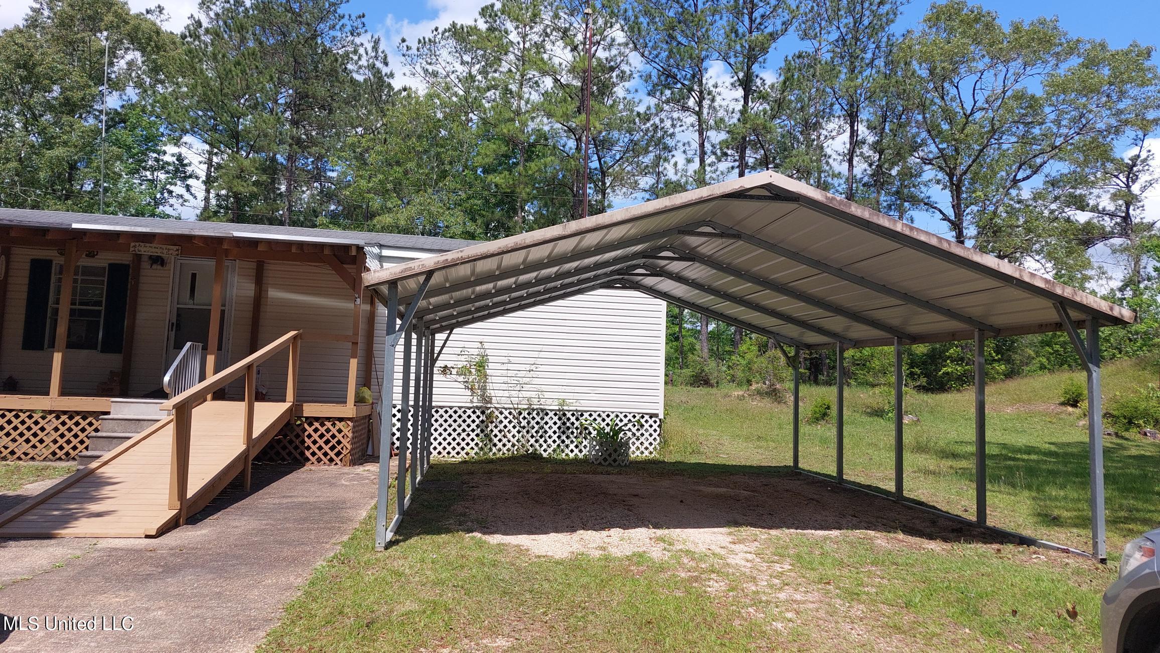 227 Go Go Road Poplarville, MS 39470 - Photo 2 of 23 20220505_112158