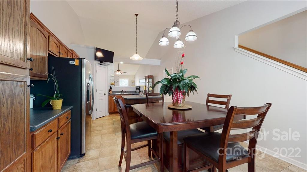 1447 George Dunn Road Rock Hill, SC 29730 - Photo 21 of 44 a dining room with furniture and chandelier
