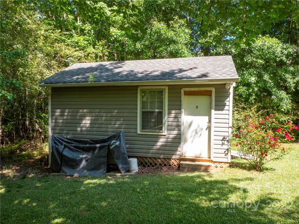 1447 George Dunn Road Rock Hill, SC 29730 - Photo 43 of 44 a backyard of a house with table and chairs