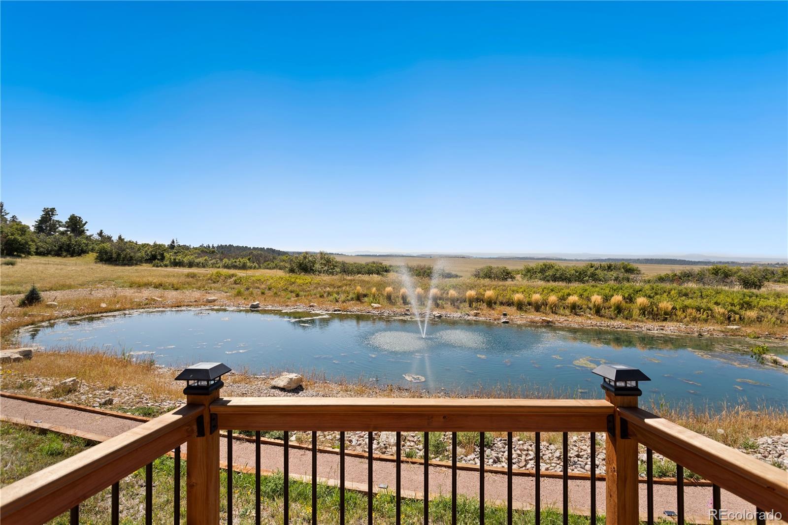 Lot 4 Wildstone Ranch Elbert, CO 80106 - Photo 24 of 42 a view of a lake with a city view